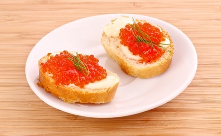 Red caviar and breadの写真素材