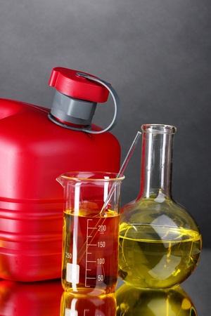 canister and fuel in test tubes on gray backgroundの写真素材