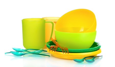 bright plastic tableware isolated on whiteの写真素材