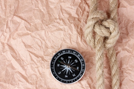 compass and rope on paper backgroundの写真素材