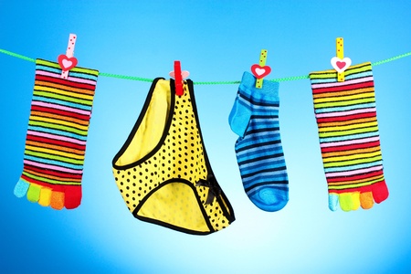 bright socks and shorts on a blue backgroundの写真素材
