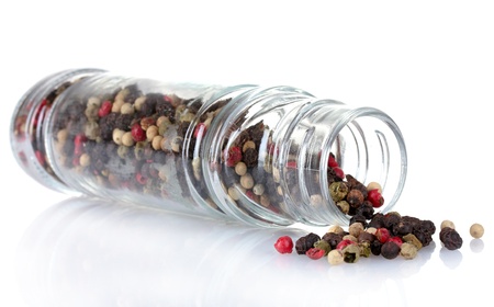 spice pepper in the glass isolated on whiteの写真素材