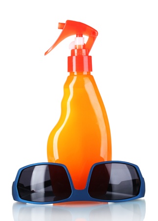 sunblock in bottle and sunglasses isolated on whiteの写真素材