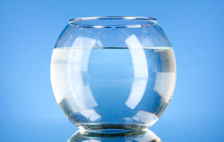 Aquarium with water on blue backgroundの写真素材