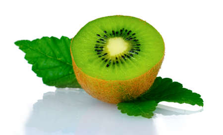 Juicy kiwi fruit and leaves isolated on whiteの写真素材