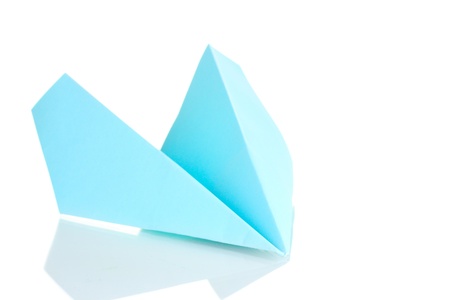 Origami paper airplane isolated on whiteの写真素材