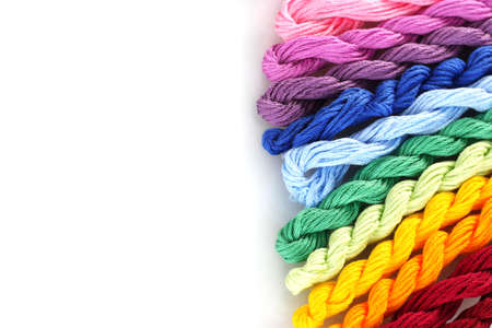 sewing threads for embroidery isolated on whiteの写真素材