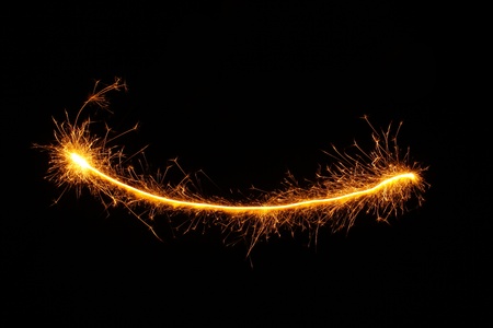 beautiful sparkler on black backgroundの写真素材