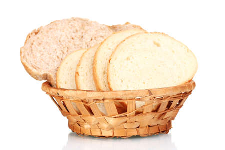 delicious sliced bread in wicker basket isolated on whiteの写真素材