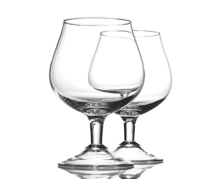 Two empty glasses isolated on whiteの写真素材