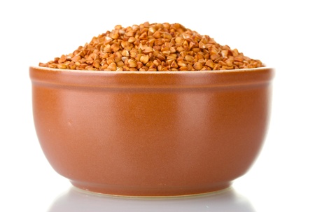 Raw buckwheat isolated on whiteの写真素材