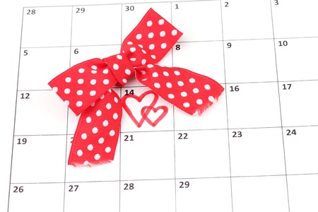Calendar page with hearts and bow on St.Valentines Dayの写真素材