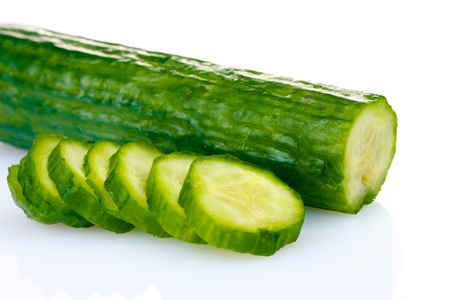 fresh cucumber isolated on whiteの写真素材