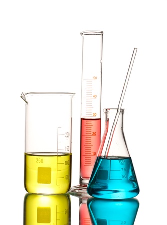 Three flasks with color liquid and with reflection isolated on whiteの写真素材