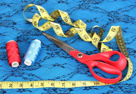 Sewing accessories on fabric