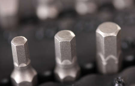 Construction bits on black closeup