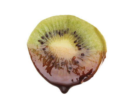 slice of ââripe kiwi with chocolate isolated on whiteの写真素材