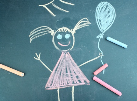 Little girl, child's drawing with chalkの写真素材