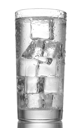 glass of water with ice isolated on whiteの写真素材