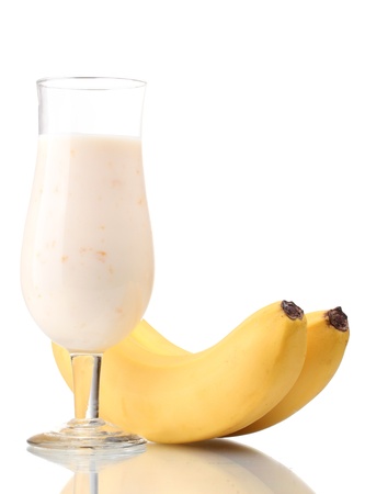 Bunch of bananas and milk cocktail isolated on whiteの写真素材