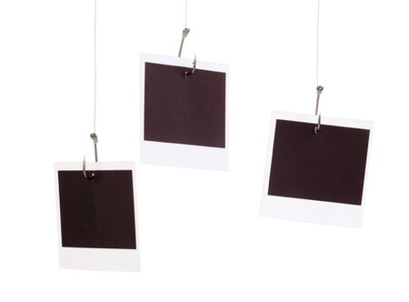 Photos on fish hooks isolated on whiteの写真素材