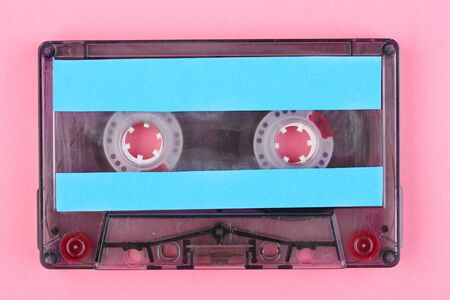 Audio cassette with color label on pink backgroundの写真素材
