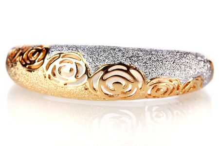 Beautiful golden bracelet  isolated on whiteの写真素材
