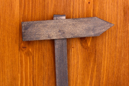Color wooden sign board on wooden backgroundの写真素材