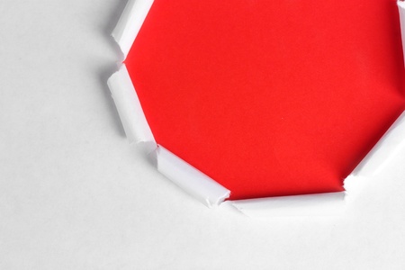 Torn paper  with red background