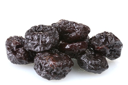 yummy dried plums isolated on whiteの写真素材