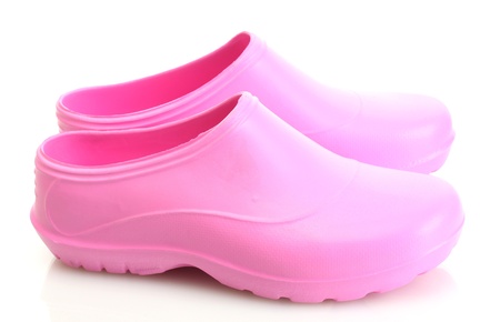 bright pink galoshes isolated on white