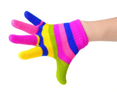 bright striped baby gloves on hand isolated on whiteの写真素材
