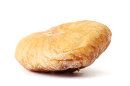 delicious dried fig isolated on whiteの写真素材