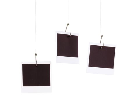 Photos on fish hooks isolated on whiteの写真素材