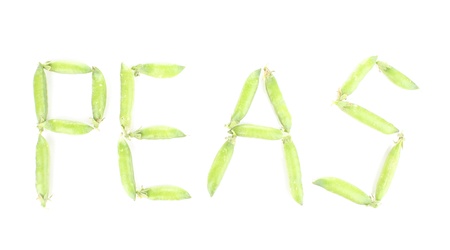 Green peas isolated on whiteの写真素材