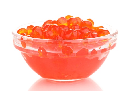 Red caviar in glass bowl isolated on whiteの写真素材