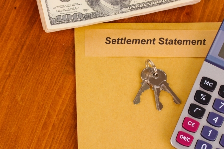 folder with the settlement statement on wooden background close-upの写真素材