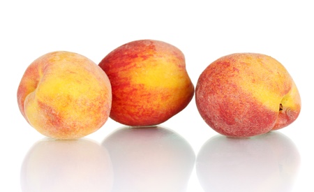 ripe peaches isolated on white backgroundの写真素材