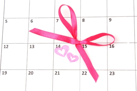 Calendar page with hearts and bow on St.Valentines Dayの写真素材