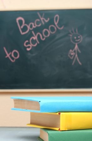 School books and the desk. Back to school.の写真素材