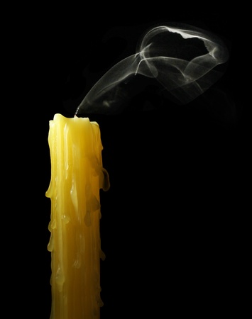 candle with abstract smoke on black backgroundの写真素材