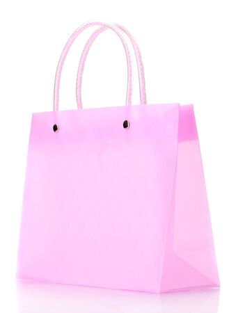 bright pink shopping bag isolated on whiteの写真素材