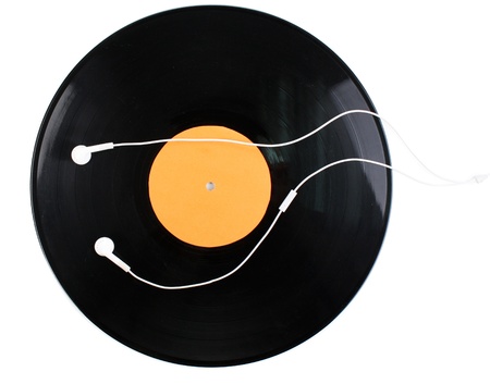 Black vinyl record and headphones isolated on whiteの写真素材