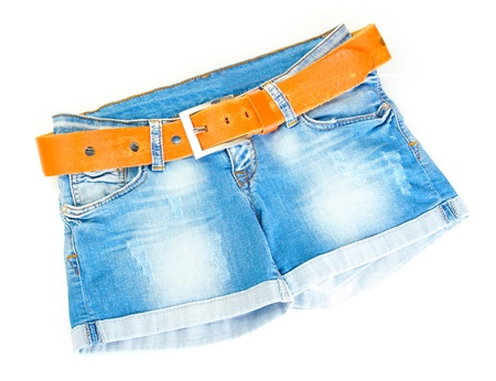 women jeans shorts with leather belt isolated on white backgroundの写真素材