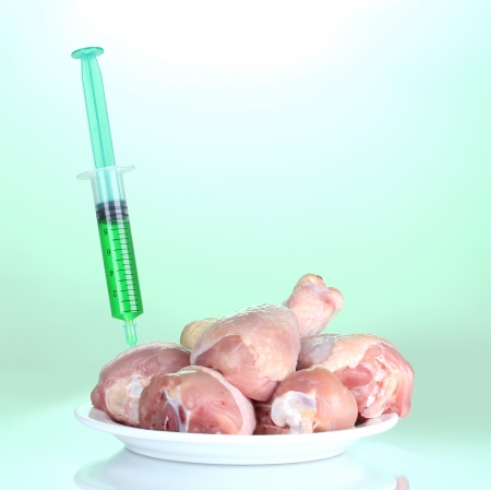 Genetically modified organism. GMO meat on blue backgroundの写真素材