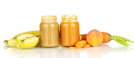 Jars with fruit and vegetables baby food isolated on whiteの写真素材