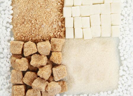 Sweetener with white and brown sugar close-upの写真素材