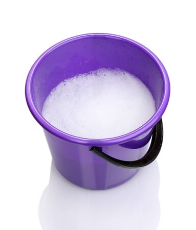 Bucket with water for cleaning isolated on whiteの写真素材