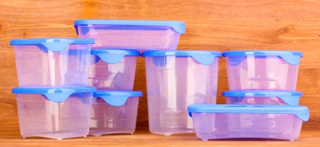 Plastic containers for food on wooden backgroundの写真素材