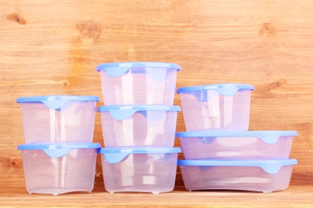 Plastic containers for food on wooden backgroundの写真素材